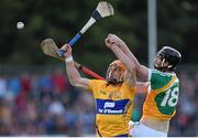4 July 2015; John Conlon, Clare, in action against Gary Conneely, Offaly. GAA Hurling All-Ireland Senior Championship, Round 1, Clare v Offaly. Cusack Park, Ennis, Co. Clare. Picture credit: Stephen McCarthy / SPORTSFILE