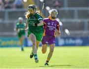 4 July 2015; Rebecca Delee, Limerick, in action against Kate Kelly, Wexford. Liberty Insurance Camogie Championship, Wexford v Limerick. Innovate Wexford Park, Wexford. Picture credit: Matt Browne / SPORTSFILE