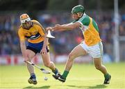 4 July 2015; Conor McGrath, Clare, in action against David King, Offaly. GAA Hurling All-Ireland Senior Championship, Round 1, Clare v Offaly. Cusack Park, Ennis, Co. Clare. Picture credit: Stephen McCarthy / SPORTSFILE