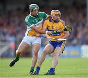 4 July 2015; John Conlon, Clare, in action against David King, Offaly. GAA Hurling All-Ireland Senior Championship, Round 1, Clare v Offaly. Cusack Park, Ennis, Co. Clare. Picture credit: Stephen McCarthy / SPORTSFILE