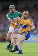 4 July 2015; John Conlon, Clare, in action against David King, Offaly. GAA Hurling All-Ireland Senior Championship, Round 1, Clare v Offaly. Cusack Park, Ennis, Co. Clare. Picture credit: Stephen McCarthy / SPORTSFILE
