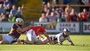 4 July 2015; Seamus Harnedy, Cork, scores the second goal against Wexford past goalkeeper Mark Fanning and defender Liam Ryan. GAA Hurling All-Ireland Senior Championship, Round 1, Wexford v Cork. Innovate Wexford Park, Wexford. Picture credit: Matt Browne / SPORTSFILE