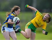 4 July 2015; Ciara Dwan, Tipperary, in action against Eimerar Alcorn, Donegal. All Ireland Ladies Football U14 'B' Championship, Donegal v Tipperary. Ballymahon, Co. Longford. Picture credit: David Maher / SPORTSFILE