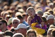 4 July 2015; Wexford supporter Conor Moore, from Gorey, watches his team in action against Cork. GAA Hurling All-Ireland Senior Championship, Round 1, Wexford v Cork. Innovate Wexford Park, Wexford. Picture credit: Matt Browne / SPORTSFILE