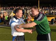 4 July 2015; Clare manager Davy Fitzgerald and Offaly manager Brian Whelahan shake hands after the game. GAA Hurling All-Ireland Senior Championship, Round 1, Clare v Offaly. Cusack Park, Ennis, Co. Clare. Picture credit: Stephen McCarthy / SPORTSFILE