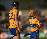 4 July 2015; Colm Galvin replaces his Clare team-mate Darach Honan during a second half substitution. GAA Hurling All-Ireland Senior Championship, Round 1, Clare v Offaly. Cusack Park, Ennis, Co. Clare. Picture credit: Stephen McCarthy / SPORTSFILE
