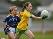4 July 2015; Clodagh Ni Ghallchoir, Donegal, in action against Ciara Maher , Tipperary. All Ireland Ladies Football U14 'B' Championship, Donegal v Tipperary. Ballymahon, Co. Longford. Picture credit: David Maher / SPORTSFILE