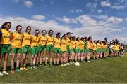 4 July 2015; The Donegal team stand for the national anthem. All Ireland Ladies Football U14 'B' Championship, Donegal v Tipperary. Ballymahon, Co. Longford. Picture credit: David Maher / SPORTSFILE