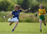 4 July 2015; Caitlin Kennedy, Tipperary, in action against Megan Ryan, Donegal. All Ireland Ladies Football U14 'B' Championship, Donegal v Tipperary. Ballymahon, Co. Longford. Picture credit: David Maher / SPORTSFILE