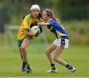 4 July 2015; Amy Boyle Carr, Donegal, in action against Niamh Martin, Tipperary. All Ireland Ladies Football U14 'B' Championship, Donegal v Tipperary. Ballymahon, Co. Longford. Picture credit: David Maher / SPORTSFILE