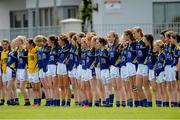 4 July 2015; Tipperary team stand together during the national anthem. All Ireland Ladies Football U14 'B' Championship, Donegal v Tipperary. Ballymahon, Co. Longford. Picture credit: David Maher / SPORTSFILE