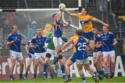 4 July 2015; Michael Quinn, Longford, fists away a late dropping ball ahead of Gary Brennan, Clare. GAA Football All-Ireland Senior Championship, Round 2A, Clare v Longford. Cusack Park, Ennis, Co. Clare. Picture credit: Stephen McCarthy / SPORTSFILE