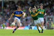 5 July 2015; Tommy Nolan, Tipperary, in action against Gavin White, Kerry. Electric Ireland Munster GAA Football Minor Championship Final, Kerry v Tipperary. Fitzgerald Stadium, Killarney, Co. Kerry. Picture credit: Eoin Noonan / SPORTSFILE