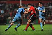 20 September 2008; Tony Buckley, Munster, is tackled by Paul Tito, left, and Ceri Sweeney, Cardiff Blues. Magners League, Munster v Cardiff Blues, Musgrave Park, Cork. Picture credit: Stephen McCarthy / SPORTSFILE