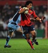 20 September 2008; Doug Howlett, Munster, is tackled by Ceri Sweeney, Cardiff Blues. Magners League, Munster v Cardiff Blues, Musgrave Park, Cork. Picture credit: Stephen McCarthy / SPORTSFILE
