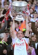 21 September 2008; Tyrone captain Brian Dooher lifts the Sam Maguire Cup after victory over Kerry. GAA Football All-Ireland Senior Championship Final, Kerry v Tyrone, Croke Park, Dublin. Picture credit: Brendan Moran / SPORTSFILE