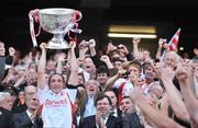 21 September 2008; Tyrone captain Brian Dooher lifts the Sam Maguire Cup after victory over Kerry. GAA Football All-Ireland Senior Championship Final, Kerry v Tyrone, Croke Park, Dublin. Picture credit: David Maher / SPORTSFILE