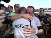 21 September 2008; Tyrone captain Brian Dooher embraces manager Mickey Harte after the game. GAA Football All-Ireland Senior Championship Final, Kerry v Tyrone, Croke Park, Dublin. Picture credit: Brendan Moran / SPORTSFILE