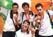 19 September 2008; Irish athletes, from left, Michael McKillop, from Glengormley, Co. Antrim, who won a gold medal in the Men's 800m - T37, Darragh McDonald, from Gorey, Co. Wexford, who won a silver medal in the Men's 400m Freestyle - S6 Final, Jason Smyth, from Eglinton, Co. Derry, who won two gold medals in the Men's 200m -T13 Final and Men's 100m T13 Final and Gabriel Shelly, from Bagenalstown, Co. Carlow, who won a bronze medal in the Boccia Mixed Individual - BC1, front, at Dublin Airport as the Irish Paralympic Team arrived home from Beijing. Dublin Airport, Dublin. Picture credit: Stephen McCarthy / SPORTSFILE