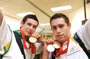 19 September 2008; Michael McKillop, from Glengormley, Co. Antrim, who won a gold medal in the Men's 800m - T37, left, and Jason Smyth, from Eglinton, Co. Derry, who won two gold medals in the Men's 200m -T13 Final and Men's 100m T13 Final, at Dublin Airport as the Irish Paralympic Team arrived home from Beijing. Dublin Airport, Dublin. Picture credit: Stephen McCarthy / SPORTSFILE