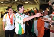 19 September 2008; Irish athletes Jason Smyth, left, from Eglinton, Co. Derry, who won two gold medals in the Men's 200m -T13 Final and Men's 100m T13 Final, and Michael McKillop, from Glengormley, Co. Antrim, who won a gold medal in the Men's 800m - T37, at Dublin Airport as the Irish Paralympic Team arrived home from Beijing. Dublin Airport, Dublin. Picture credit: Stephen McCarthy / SPORTSFILE