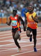 8 September 2008;  Angola's Miguel Francisco, left, runs with his guide during the Men's 100m - T11 Round 1 Heat 1. Beijing Paralympic Games 2008, Men's 100m - T11 Round 1 Heat 1, National Stadium, Olympic Green, Beijing, China. Picture credit: Brian Lawless / SPORTSFILE