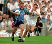 12 August 2000; Vinny Murphy of Dublin in action against Brian Lacey of Kildare during the Bank of Ireland Leinster Senior Football Championship Final replay match between Dublin and Kildare at Croke Park in Dublin. Photo by Brendan Moran/Sportsfile