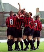 18 August 2000; Trevor Molloy of Bohemians, 2nd from left, is congratulated by team-mates after scoring their side's first goal during the Eircom League Premier Division match between Bohemians and Galway United at Dalymount Park in Dublin. Photo by David Maher/Sportsfile