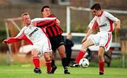18 August 2000; Mark Dempsey of Bohemians in action against Ger Crossley, left, and Darrell Mooney of Galway United during the Eircom League Premier Division match between Bohemians and Galway United at Dalymount Park in Dublin. Photo by David Maher/Sportsfile