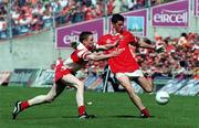 20 August 2000; Kieran Murphy of Cork in action against Joe Diver of Derry during the All-Ireland Minor Football Championship Semi-Final match between Cork and Derry at Croke Park in Dublin. Photo by John Mahon/Sportsfile