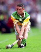 13 August 2000; Eoghan Carroll of Offaly takes a sideline cut during the All-Ireland Minor Hurling Championship Semi-Final match between Galway and Offaly at Croke Park in Dublin. Photo by Ray McManus/Sportsfile