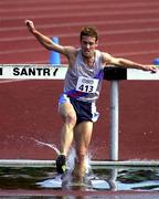 19 August 2000; Cormac Smith jumps the water jump on his way to winning the Men's 300m Steeplechase during the AAI National Track and Field Championships of Ireland at Morton Stadium in Dublin. Photo by Matt Browne/Sportsfile