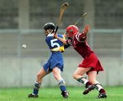 12 August 2000; Sinead Nealon of Tipperary in action against Carmel Hannon of Galway during the All-Ireland Senior Camogie Championship Semi-Final match between Tipperary and Galway at Parnell Park in Dublin. Photo by David Maher/Sportsfile