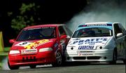 20 August 2000; Mervyn Miller, left, takes the first bend with Clive Pratt during the Alasta Autos Italian Saloon Car Cup during the Phoenix Park Motor Races at the Phoenix Park in Dublin. Photo by Matt Browne/Sportsfile