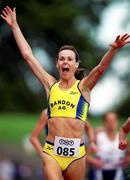 20 August 2000; Breda Dennehy Willis of Bandon AC, Cork, celebrates winning the Women's 5000m Final during the AAI National Track and Field Championships of Ireland at Morton Stadium in Dublin. Photo by Brendan Moran/Sportsfile