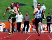 20 August 2000; Paul Brizzel of Ballymena and Antrim AC, Antrim, leads Gordon Kennedy of Tullamore Harriers AC, Offaly, on his way to winning the Men's 100m Final during the AAI National Track and Field Championships of Ireland at Morton Stadium in Dublin. Photo by Brendan Moran/Sportsfile