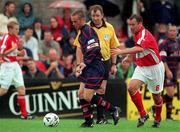 13 August 2000; Shane Harte of St Patrick's Athletic in action against Kelvin Flanagan of Cork City during the eircom League Premier Division match between Cork City and St Patrick's Athletic at Turners Cross in Cork. Photo by Brendan Moran/Sportsfile