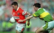 20 August 2000; Diarmuid Marsden of Armagh in action against Michael McCarthy of Kerry during the Bank of Ireland All-Ireland Senior Football Championship Semi-Final match between Kerry and Armagh at Croke Park in Dublin. Photo by Damien Eagers/Sportsfile