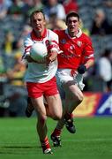 20 August 2000; Damien Canning of Derry in action against Noel O'Leary of Cork during the All-Ireland Minor Football Championship Semi-Final match between Cork and Derry at Croke Park in Dublin. Photo by Aoife Rice/Sportsfile