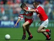 20 August 2000; Gavin Donaghy of Derry in action against Cork during the All-Ireland Minor Football Championship Semi-Final match between Cork and Derry at Croke Park in Dublin. Photo by Damien Eagers/Sportsfile