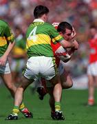 20 August 2000; Cathal O'Rourke of Armagh in action against Mike McCarthy of Kerry during the Bank of Ireland All-Ireland Senior Football Championship Semi-Final match between Kerry and Armagh at Croke Park in Dublin. Photo by Damien Eagers/Sportsfile