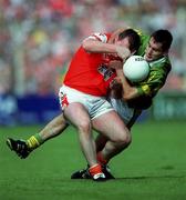20 August 2000; Cathal O'Rourke of Armagh in action against Tom O'Sullivan of Kerry during the Bank of Ireland All-Ireland Senior Football Championship Semi-Final match between Kerry and Armagh at Croke Park in Dublin. Photo by Damien Eagers/Sportsfile