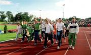 20 August 2000; Members of the Ireland Olympic team for the 2000 Sydney Olympics are introduced to the crowd after the AAI National Track and Field Championships of Ireland at Morton Stadium in Dublin. Photo by Brendan Moran/Sportsfile