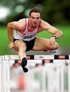 20 August 2000; Peter Coghlan of Crusaders AC, Dublin, in action in the Men's 110m Hurdles during the AAI National Track and Field Championships of Ireland at Morton Stadium in Dublin. Photo by Brendan Moran/Sportsfile