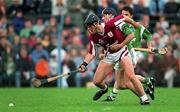 5 October 1997; Joe Rabbitte of Galway in action against mike Nash of Limerick during the Church & General National Hurling League Division 1 Final match between Limerick and Galway at Cusack Park in Ennis, Clare. Photo by Ray McManus/Sportsfile