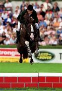 11 August 2000; Billy Twomey on Conquest II during the Nations Cup at the Kerrygold Horse Show at the RDS Arena in Dublin. Photo by John Mahon/Sportsfile