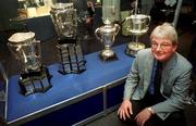 23 August 2000; Michael MacCarthy, great grandson of Liam MacCarthy, pictured with the four All-Ireland Senior Hurling Championship trophies played for since the late 19th century, which were together for the first time, at the opening of an exhibition commemorating Liam MacCarthy at the GAA Museum in Croke Park Photo by David Maher/Sportsfile