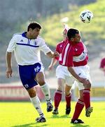 24 August 2000; Pat Morley of Cork City in action against Daniel Puce of Lausanne during the UEFA Cup Qualifying Round Second Leg match between Cork City and Lausanne at Turner's Cross in Cork. Photo by Matt Browne/Sportsfile