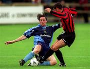 27 August 2000; Clive Delaney of UCD tackles Dave Morrison of Bohemians during the Eircom League Premier Division match between UCD and Bohemians at Belfield Park in Dublin. Photo by Ray Lohan/Sportsfile