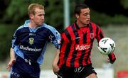 27 August 2000; Dave Morrison of Bohemians in action against Michael O'Donnell of UCD during the Eircom League Premier Division match between UCD and Bohemians at Belfield Park in Dublin. Photo by David Maher/Sportsfile